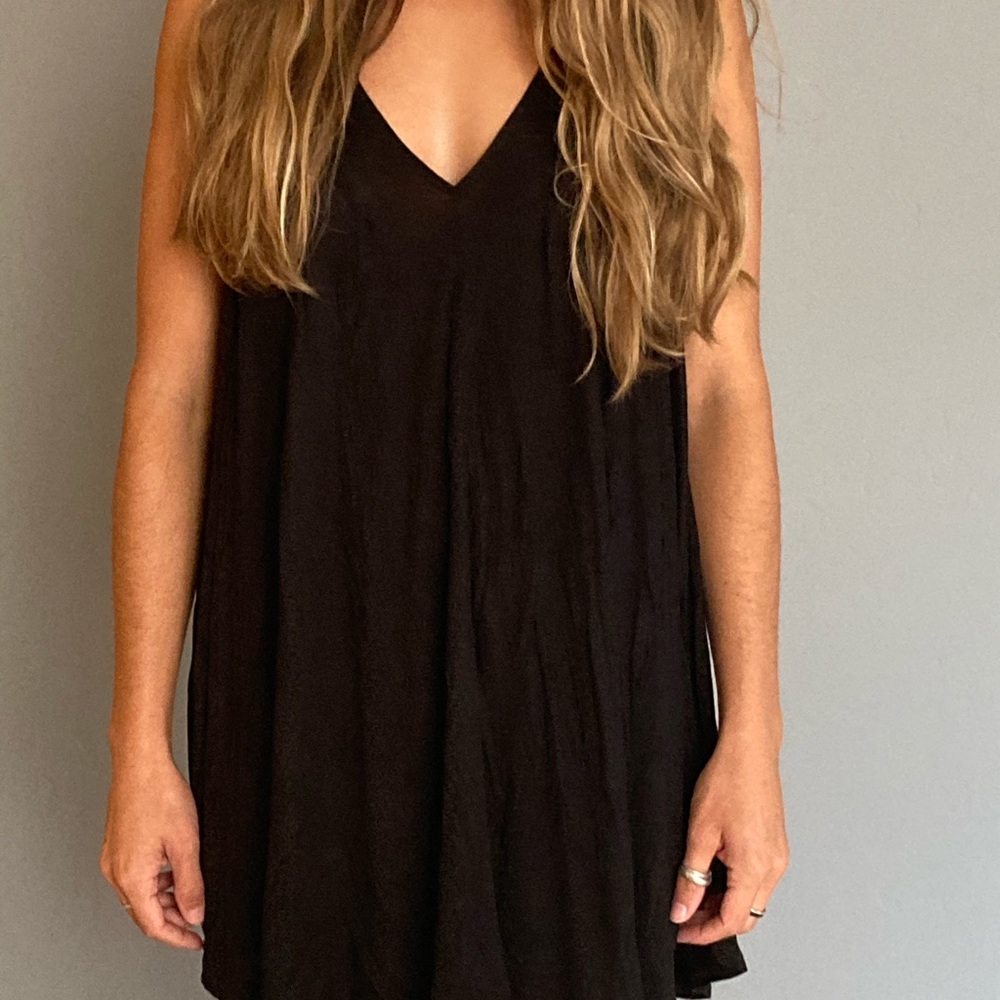 NWT: Anthropologie black flowy top Medium